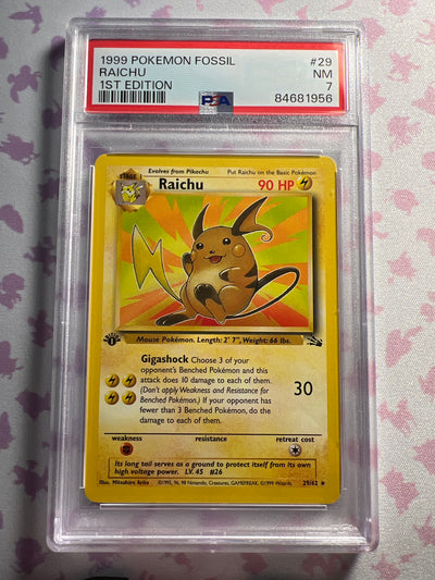 PSA 7 - Raichu - Pokemon Fossil - 1st Edition - 29/62 (1998)